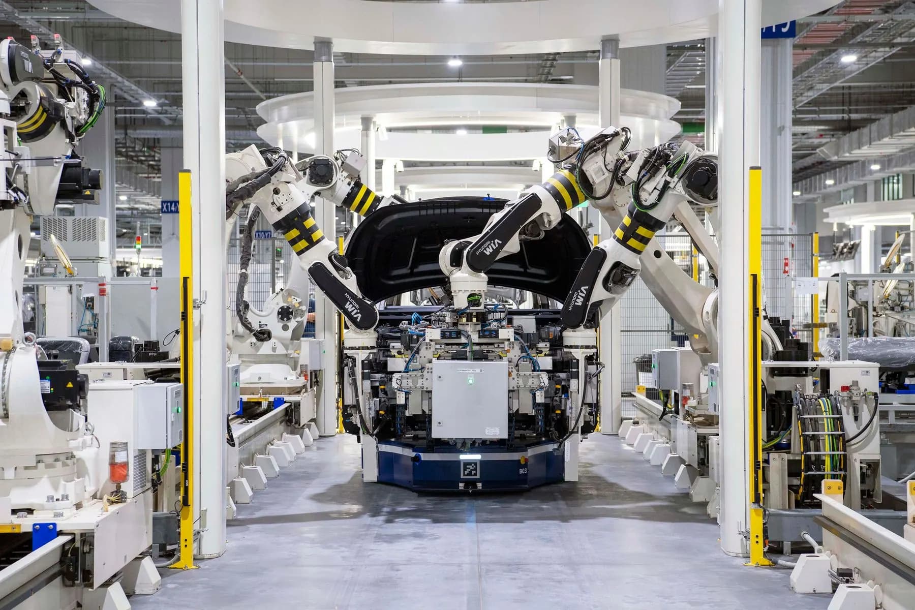 Automotive factory robotics used for manufacturer sourcing.