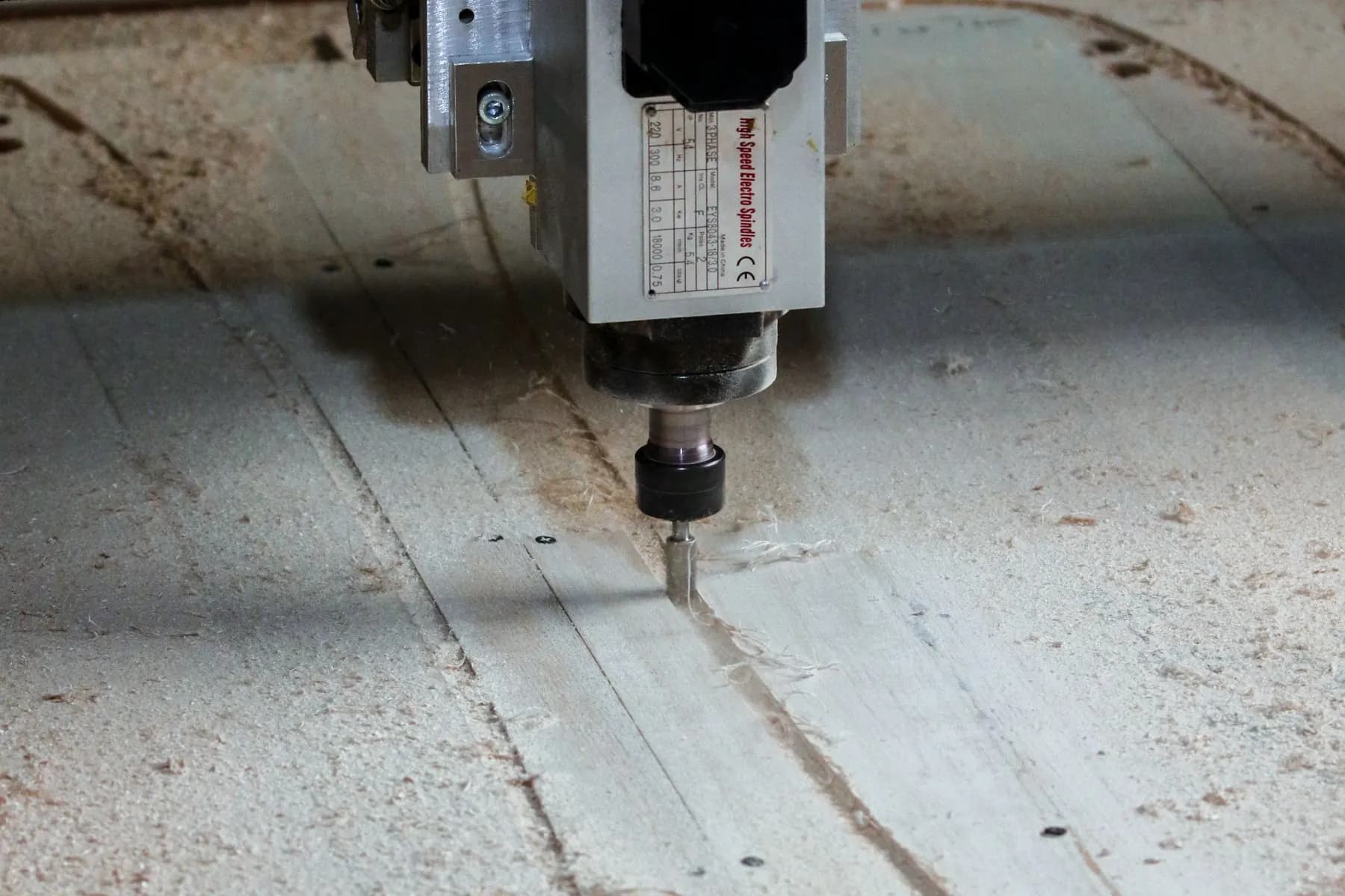 Close-up of CNC machine operation for production and quality control.